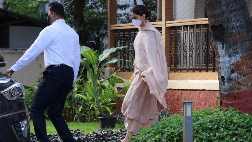 Bollywood actress Deepika Padukone leaves a guesthouse after she was questioned by Narcotics Control Bureau (NCB) officials