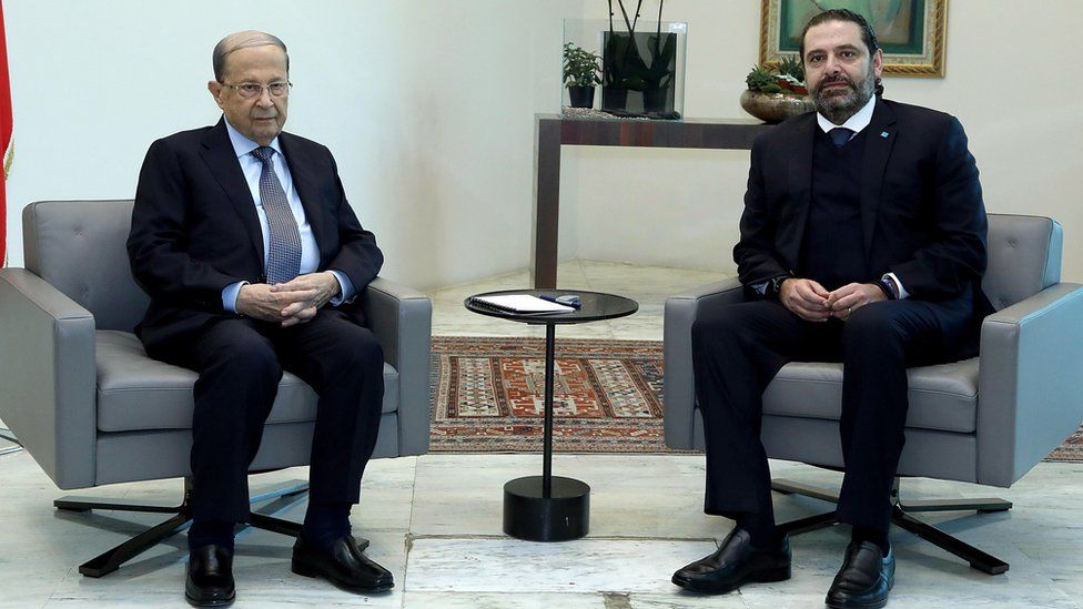 Lebanese President Michel Aoun and outgoing Prime Minister Saad Hariri at the Baabda presidential palace on 19 December 2019