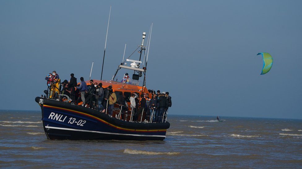 A boat of migrants arriving in Kent