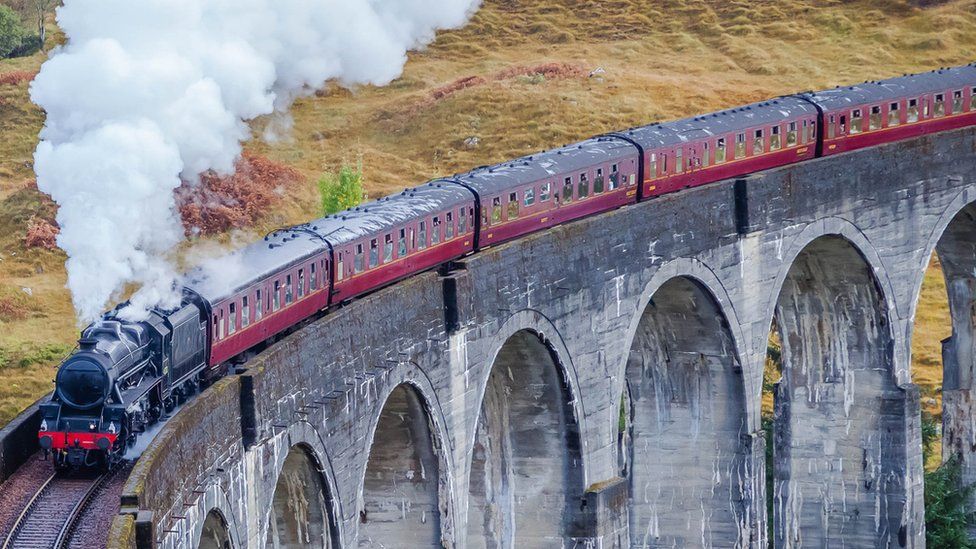 A steam train over the viaduct used in Harry Potter
