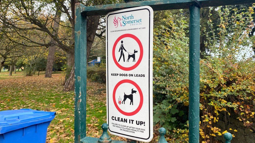 Council sign telling people to pick up after their dogs