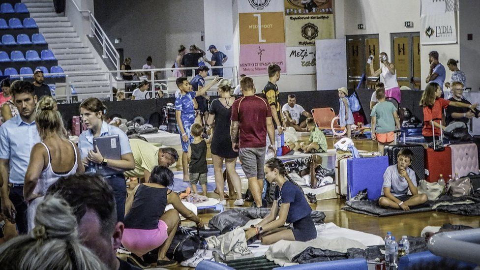 One of the sports halls in Rhodes was cleared to accommodate stranded holidaymakers on Saturday night