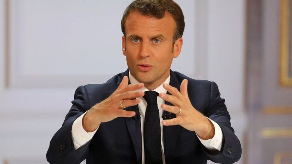 Emmanuel Macron speaking at the Elysee Palace on April 25