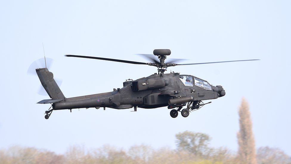 An Apache helicopter taking off from Wattisham Airfield in Suffolk