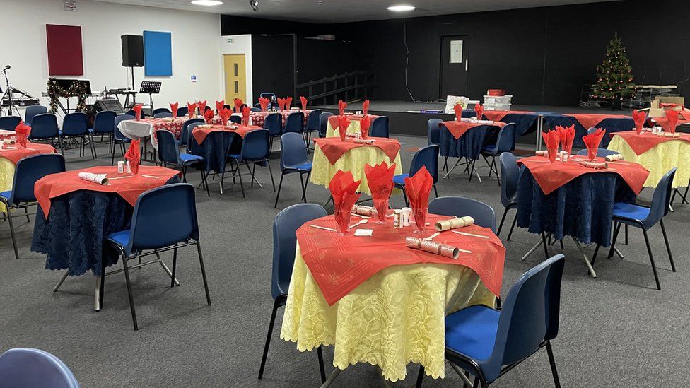Tables set ahead of a previous free Christmas Day lunch event at New Life Church in Cardigan