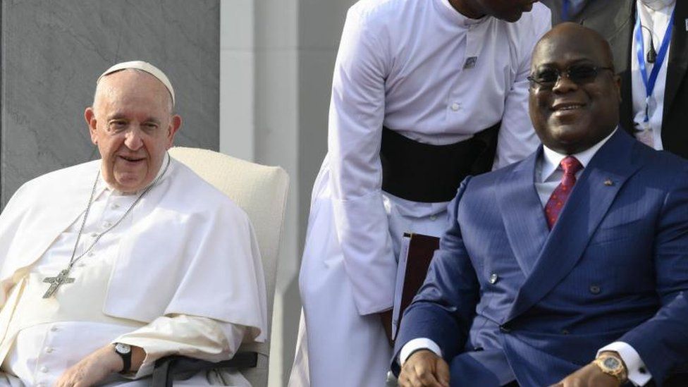A handout picture provided by the Vatican Media shows Pope Francis (L) with Congolese President Felix Tshisekedi (R)