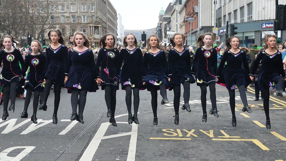 In pictures: St Patrick's Day parades return - BBC News