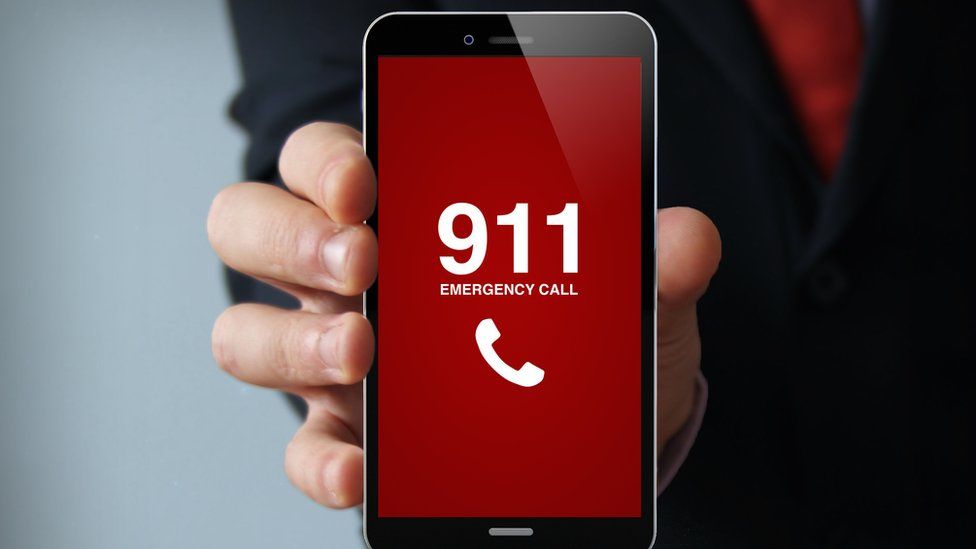 mobile phone with 911 displayed