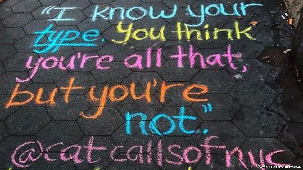 A sign written on the ground that says: "I know your type. You think you're all that, but you're not @catcallsofnyc"