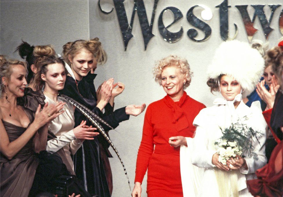 Fashion designer Vivienne Westwood and model Laetitia Casta walk the runway during the Vivienne Westwood Ready to Wear Fall/Winter 1996-1997 fashion show as part of the Paris Fashion Week on March 07, 1996