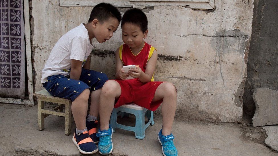 Children on a mobile phone