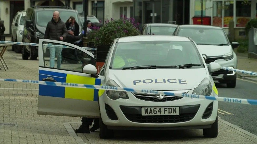 Police on Fore Street in Ivybridge.