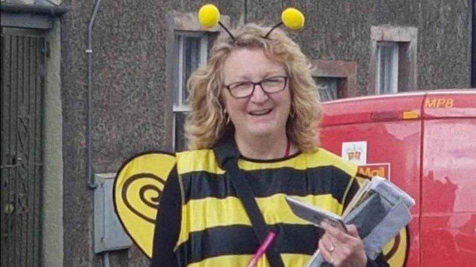 Allonby villagers throw party for muchloved retiring postie BBC News