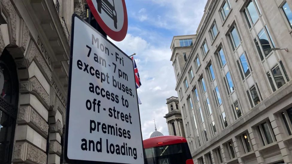 Street sign showing restrictions at Bank junction 