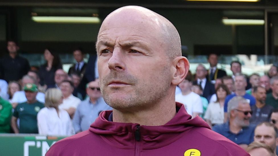 Lee Carsley standing and not singing the national anthem before England's game against Ireland