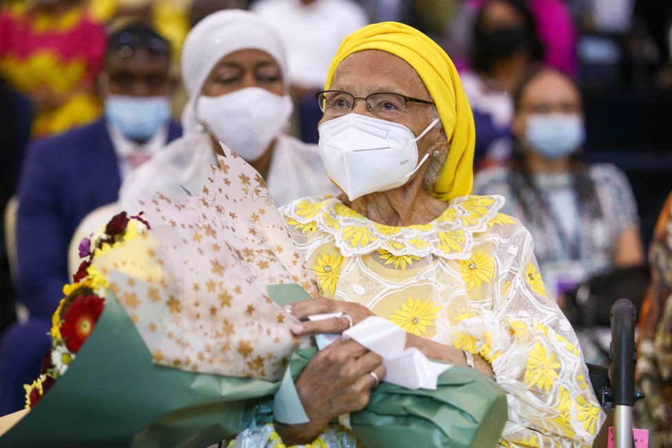 Survivor of 1921 Tulsa race massacre, 107 year-old Viola Ford Fetcher holds a bouquet, a gift from Action Chapel International during a church service in Accra, on August 15, 2021.