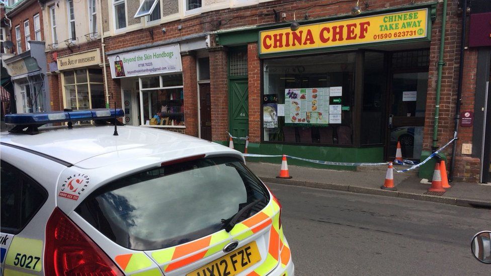 Police at scene of takeaway death