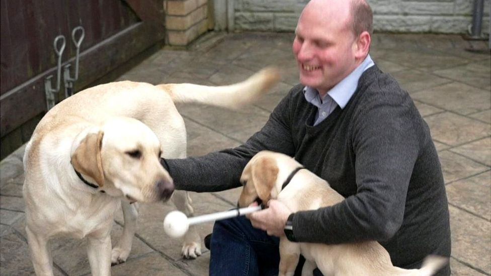 Blind exEngland footballer Dave Thomas opens Newcastle guide dogs