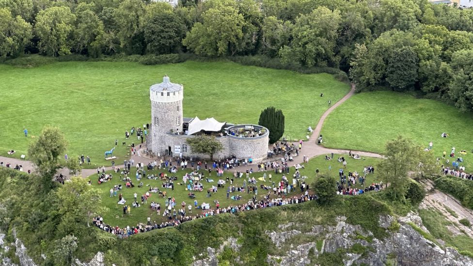 An aerial photo of crowds gathering at Clifton Observatory to watch the ascent