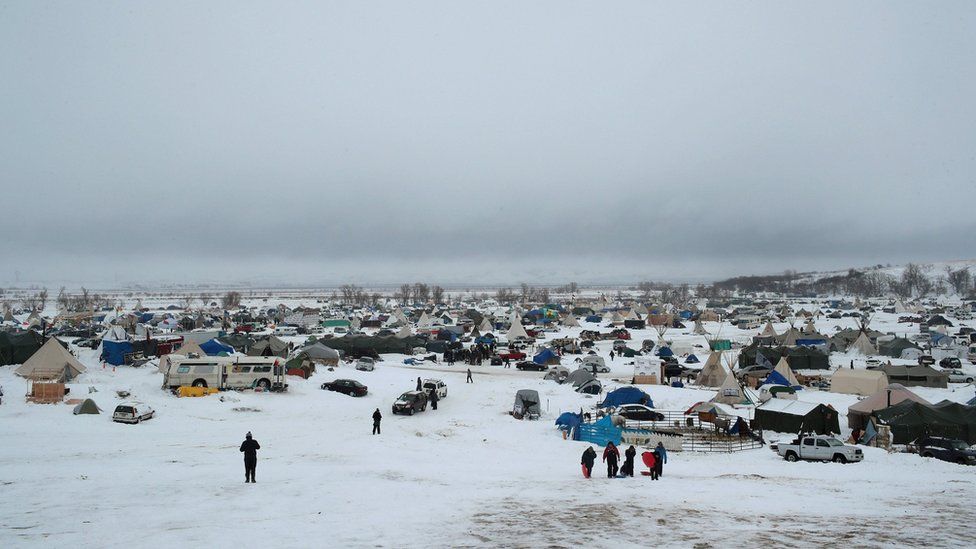 Snow covers the ground at Oceti Sakowin Camp on the edge of the Standing Rock Sioux Reservation on December 1, 2016