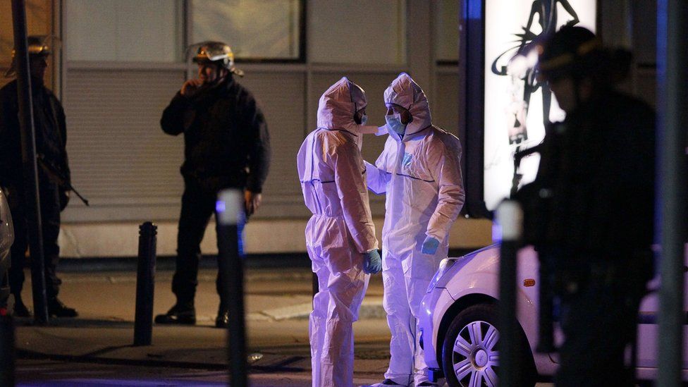Forensic experts outside Stade de France