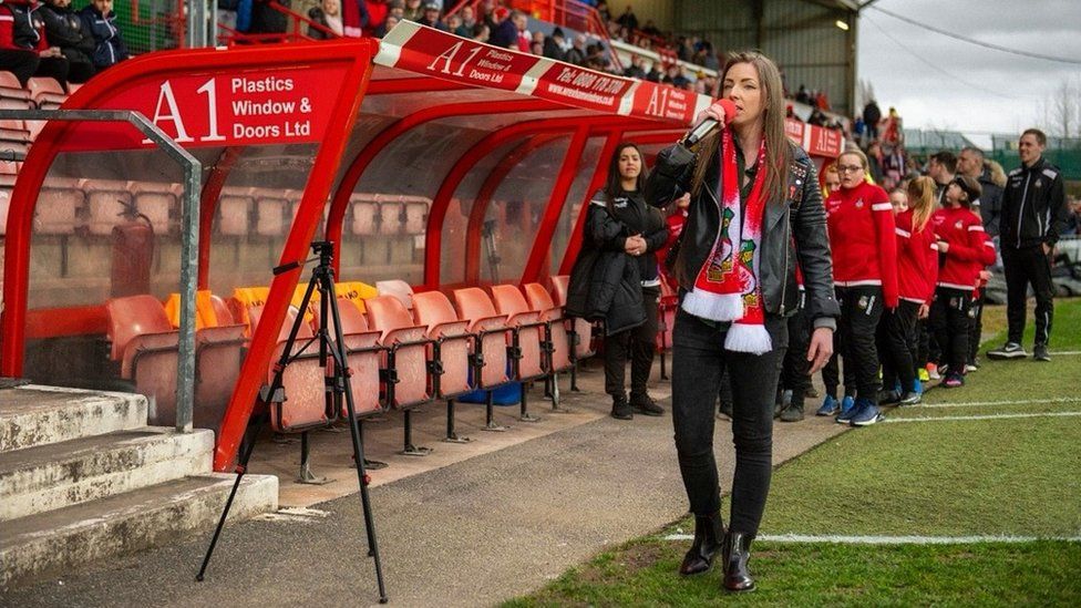 Evrah Rose performs in front of Wrexham AFC crowd