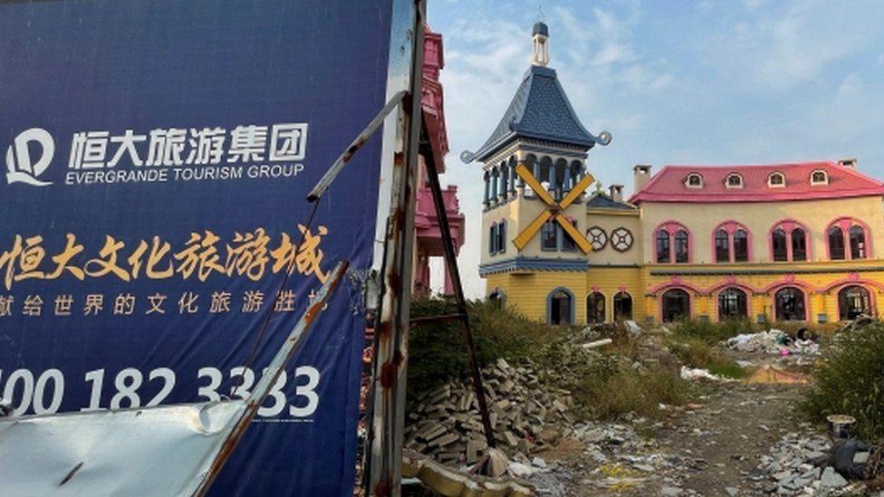 An Evergrande sign is seen at an unfinished theme park in Evergrande Cultural Tourism City, a China Evergrande Group project whose construction has halted, in Suzhou"s Taicang, Jiangsu province, China.