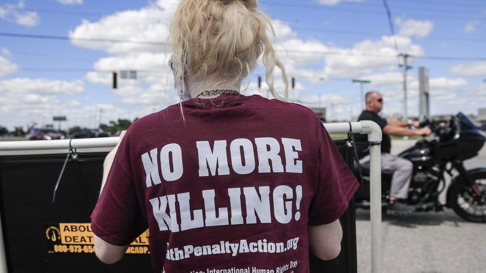 People gather to protest against the resumption of federal executions near the US Penitentiary and execution chamber in Terre Haute, Indiana, USA, 13 July 2020