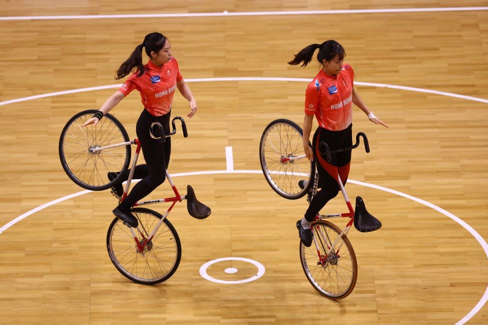 Cyclists from Hong Kong in action during Women's Elite Pair Artistic Indoor Cycling Qualification