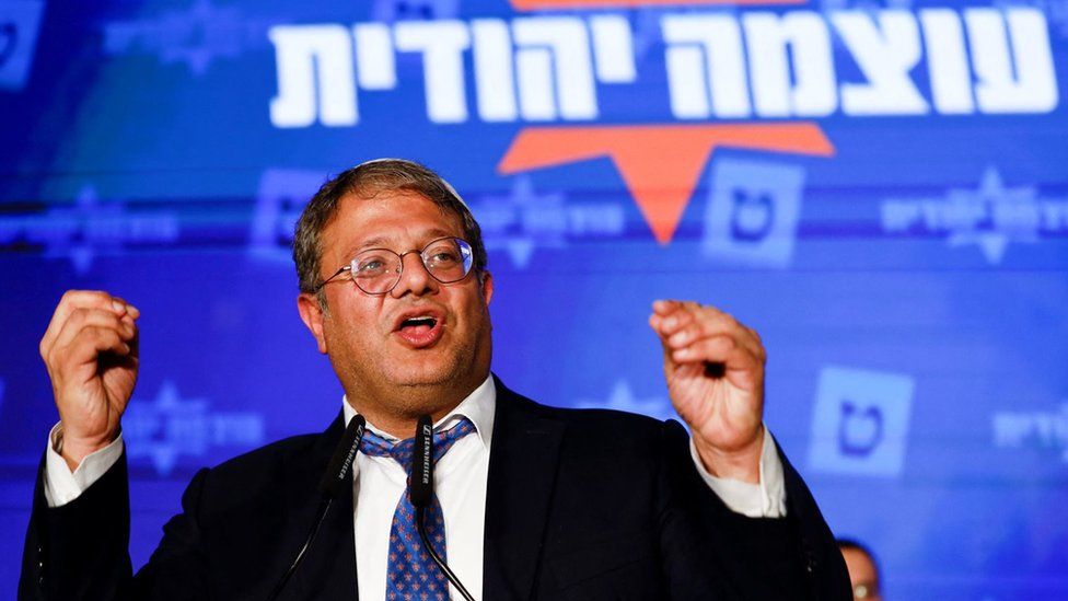 Itamar Ben-Gvir gestures at an election night rally for the Religious Zionism party's headquarters in Jerusalem (2 November 2022)