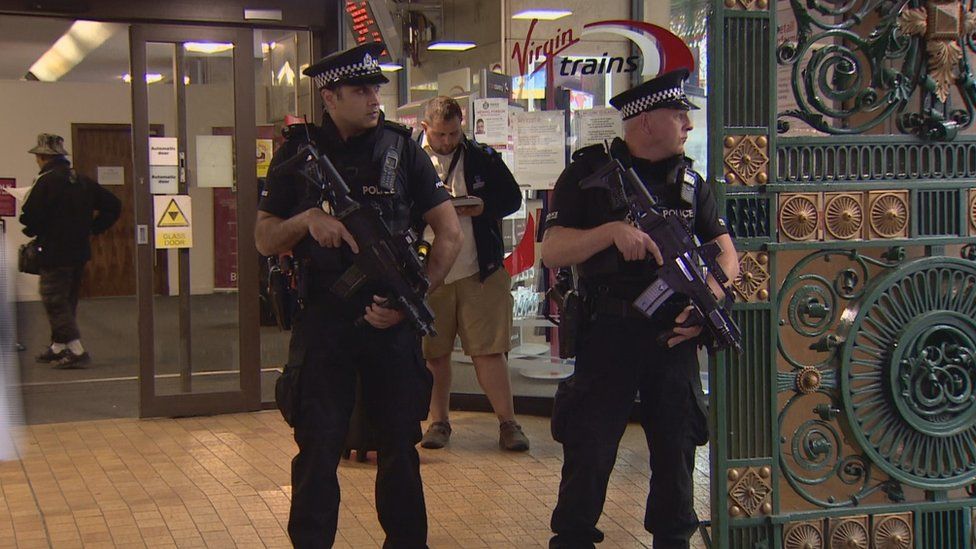 Armed police at Glasgow Central Station