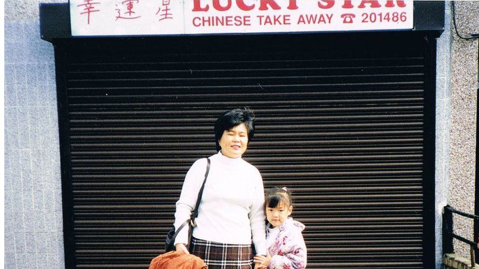 Angela and her Mum outside the takeaway in 1995.