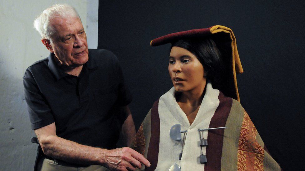 US archaeologist Dr Reinhard sitting with silicone bust of the Inca Ice Maiden