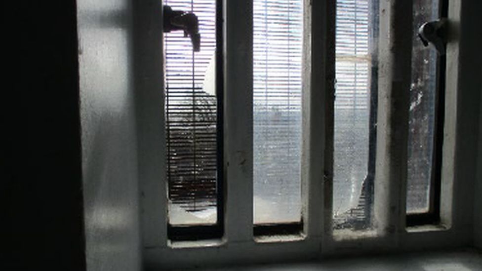 Broken cell window in HM Prison Lewes