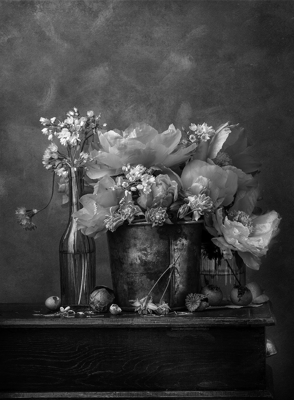 A photo of flowers in vases on a table