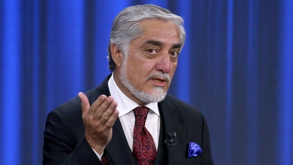 Afghan presidential candidate Abdullah Abdullah speaks during the presidential election debate at TOLO TV channel studio in Kabul, Afghanistan