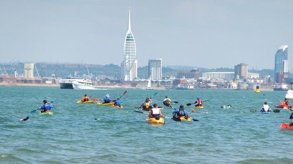 Swim with kayakers from Ryde to Southsea in 2014