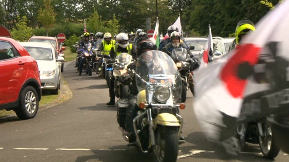 Outriders attending Mr Walsh's funeral service