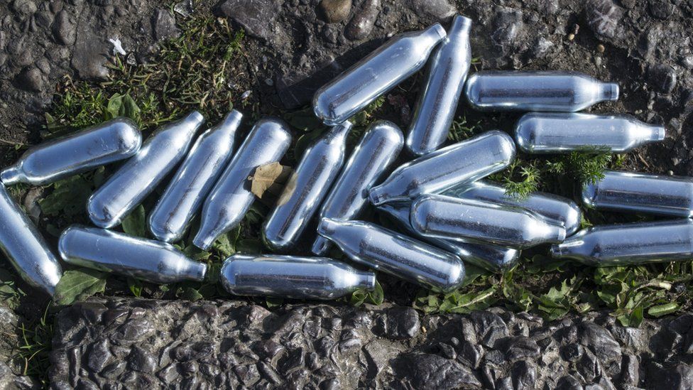 Pile of silver canisters