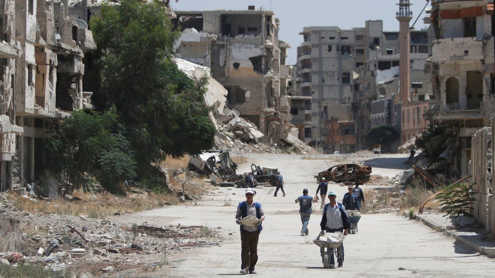 Damaged buildings following conflict in the district of Homs, Syria, 20 July 2017