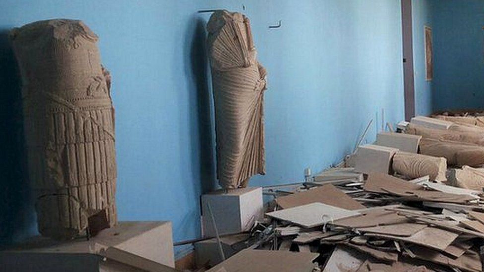 A view shows damaged artefacts inside the museum of the historic city of Palmyra, after forces loyal to Syria"s President Bashar al-Assad recaptured the city, in Homs Governorate in this handout picture provided by SANA on March 27, 2016
