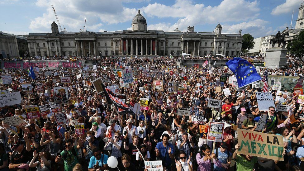 Thousands of protesters fill Trafalgar Square to protest against Donald Trump