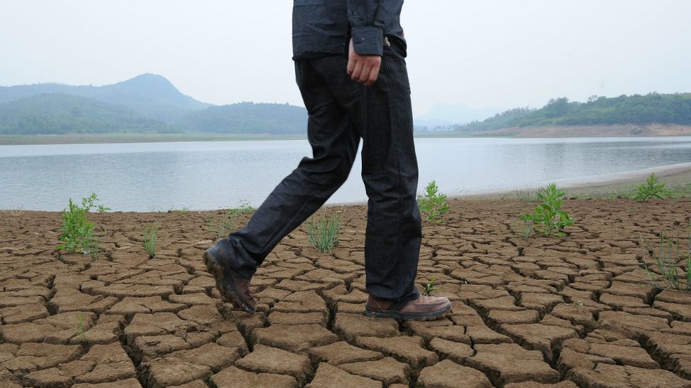 A man walks along the dried-up banks of the Yangtze river in China - 27 May 2011