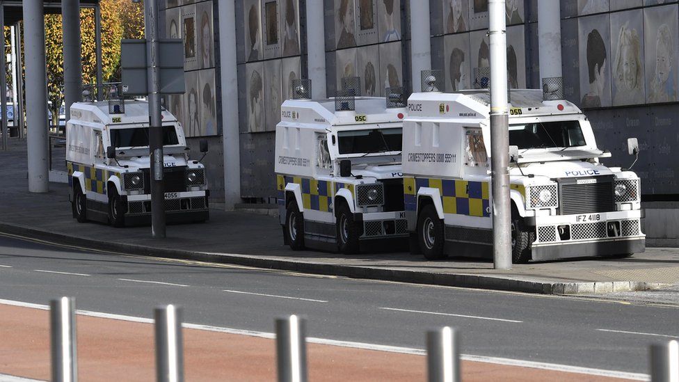 Heavy police presence outside Belfast courts earlier, armoured vehicles can be seen mounted on the pavements.