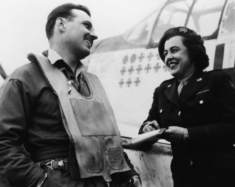 Virginia Irwin, features writer from the St Louis Post-Dispatch, interviews Lt Glennon 'Bubbles' Moran of the 352nd Fighter Group.