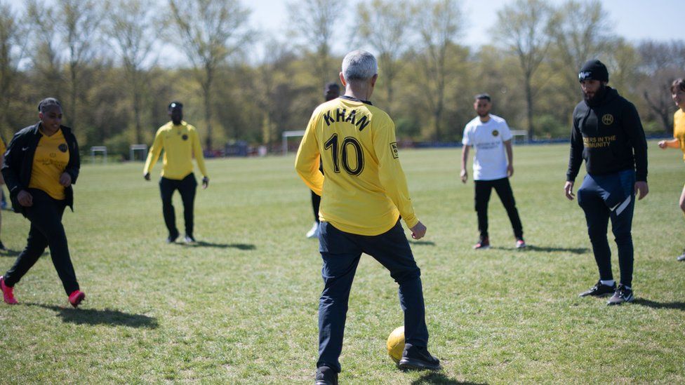 Sadiq Khan plays football with members of Hackney Wick FC