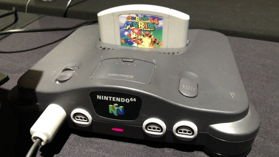 Super Mario cartridge in a Nintendo 64