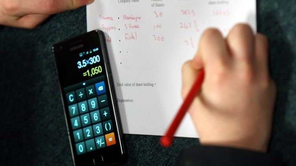 Pupil using phone as calculator