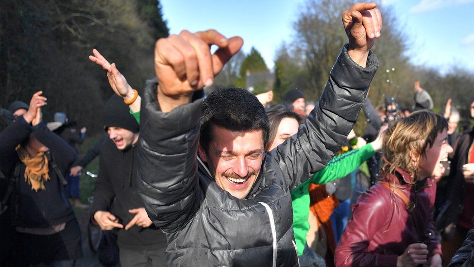 Activists celebrate after the French government announced plans of an airport in Notre-Dame-des-Landes
