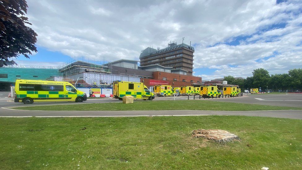 Ambulances waiting to unload patients at Gloucestershire Royal Hospital.